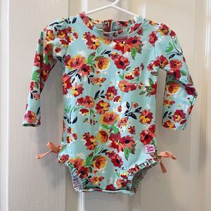 RuffleButts Painted Flowers One Piece Rash Guard Swimsuit Size 12-18 Months